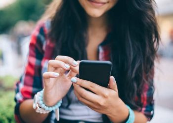 Girls use mobile