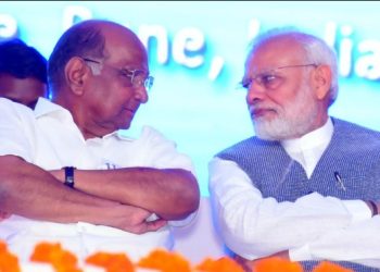 Sharad Pawar hands with PM Modi